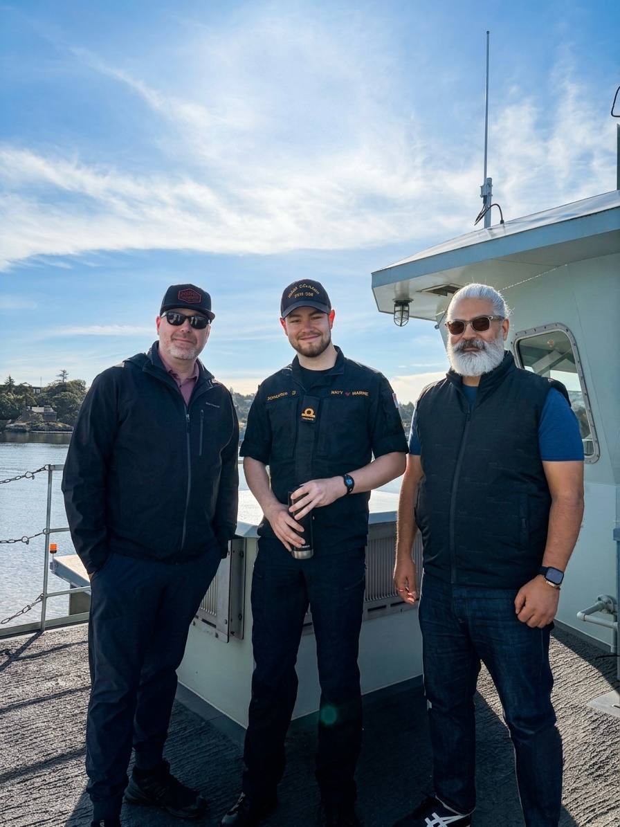 DJ Kelly, Sub-Lieutenant Cameron Donaldson, and Raj Taneja on the Orca Class Training Vessel